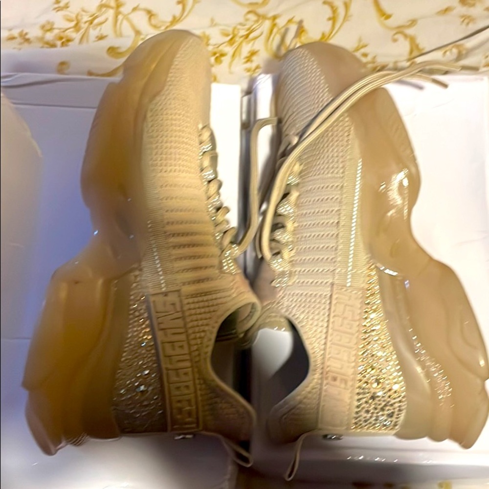 Beautiful Steven Madden sneakers.Only worn once .Like New without tag.